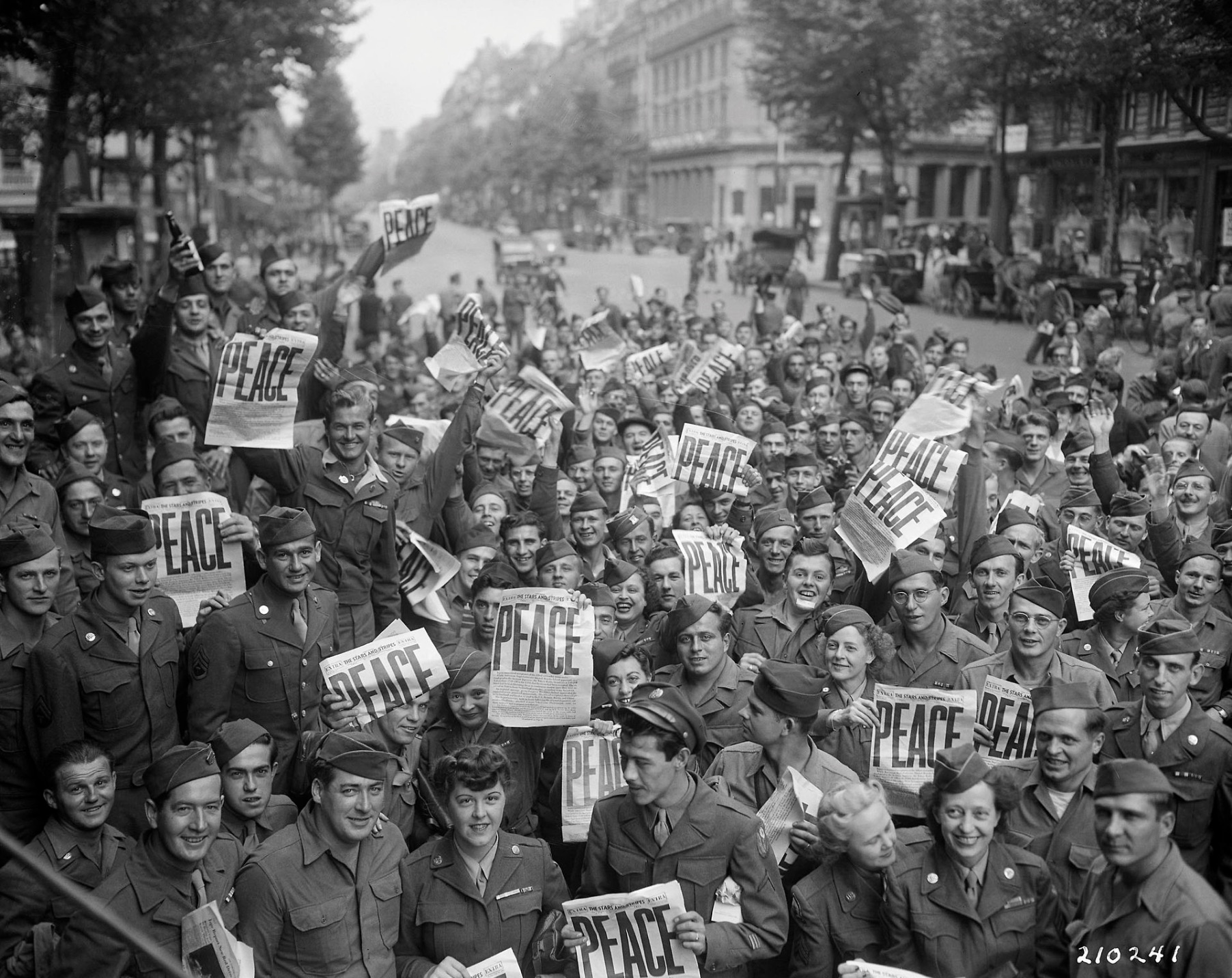 Allied military personnel in Paris celebrating V-J Day. 